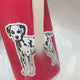 Dalmatian Dog Sticke on bottle under running water